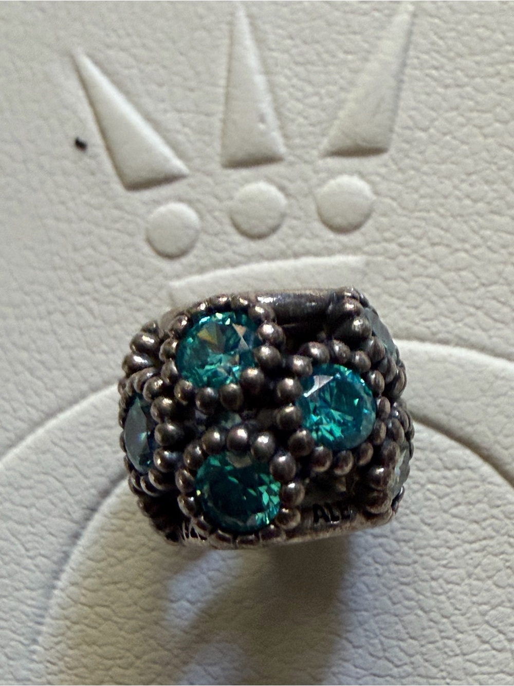 Authentic Pandora Studded Lights with Teal CZ 
Silver